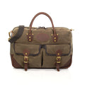 Handmade waxed canvas brief bag made with solid brass buckles and premium leather.