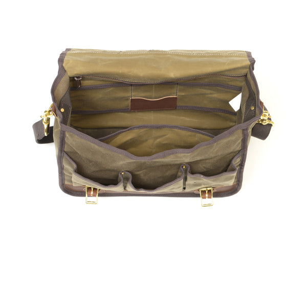 Looking inside the main compartment there are several pockets on the backside, a heavy duty zippered lid pocket, and one sleeve pocket.
