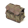 Three additional waxed canvas pockets hang off the front of the bag for easy access to supplies.