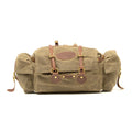 This bike bag is made from durable waxed canvas, premium leather, and solid brass.